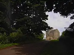Approach to the Castle with Dovecot to the left.