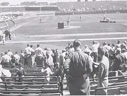 Black and white photo from the stands showing a baseball field