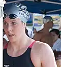Missy Franklin competing in an outdoor swimming tournament in 2014