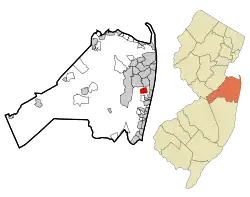 Location of Oakhurst in Monmouth County highlighted in red (left). Inset map: Location of Monmouth County in New Jersey highlighted in orange (right).