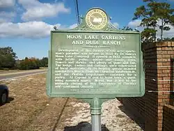Historical marker for the Moon Lake Gardens and Dude Ranch along Pasco County Road 587.