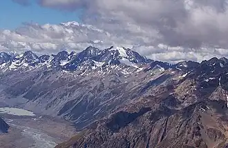Southwest aspect of the Liebig Range. Mount Conrad to left above lake, Mount Hutton centred