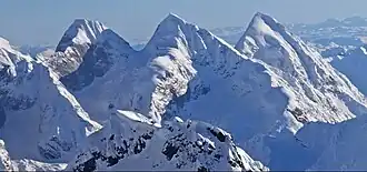 Mt. Grosvenor centered, flanked by Johnson (left), Church (right) Aerial view from northwest.