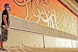 Mural, Salwa Road, Doha, Qatar by El Seed, date unknown