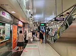 Platform D (formerly Platform B) of Outram Park MRT station serving NEL services to Punggol Coast MRT station. There is a train at the platform, and the platform doors are open.
