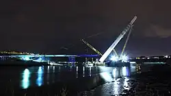 The spire being raised in 2017