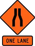 Road narrows to a single lane