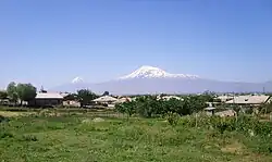 Nor Kyurin (foreground), Marmarashen (background with unfinished church), and Mt. Ararat, May 2009.