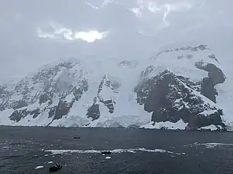 Lecointe Island from the Pampa Passage between that island and Brabant Island.