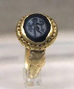Gem-inlaid gold ring of Central Asian design, tomb of Xu Xianxiu, 571 AD.[154][155]