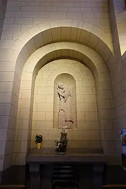 Saint Joseph carrying the infant Jesus, by Yvonne Parvillee (20th c.)