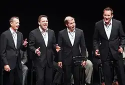 OC Times performing in Auckland, New Zealand, in September 2012. From left to right: Shawn York, Sean Devine, Cory Hunt and Patrick Claypool.