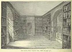 An engraving of a room with book shelves.