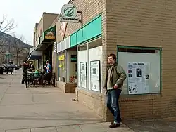 One-story brick building with a sign reading "The Onion: America's Finest News Source"