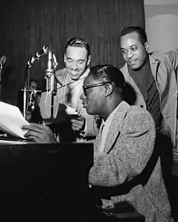 Oscar Moore (left) with Nat King Cole and Johnny Miller, c. June 1946 Photo: William P. Gottlieb