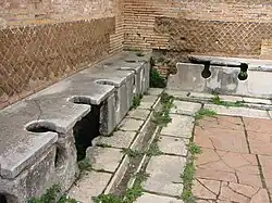 Image 30Public toilets (latrinae) from Ostia Antica (from Roman Empire)