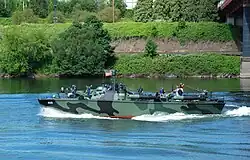 In 2011, PT-658 was restored to her original paint scheme, a camouflage pattern known as Measure 31-20L.