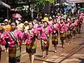 Dancers in Isan traditional dress during Songkran festival, Bueng Kan