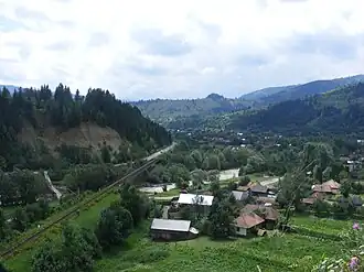 View of Palanca, with road and railway running towards the Ghimeș-Palanca Pass