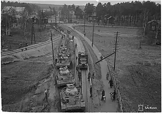 Armored vehicles on the march in Oulu (1944)