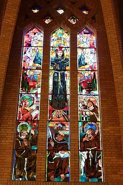 The Central window in the choir: Saint Francis founds three orders
