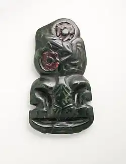 Hei-tiki; 18th century; nephrite and haliotis shell; 10.9 centimetres (4.3&nbsp;in); from the New Zealand; Los Angeles County Museum of Art (Los Angeles)