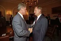 President Bill Clinton and Mel Carnahan shaking hands, 1993