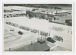 Photograph of mechanics going to work, Bainbridge Army Airfield, 1944