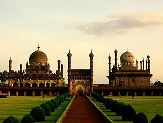 Two large buildings, seen from a distance