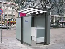 Modernist street urinal in Hamburg, Germany