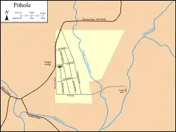 Map of Pithole and the surrounding area showing the city streets and Frazier Well, overlaid with modern roads and creeks