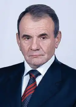 Portrait of Vladimir Platonov in a suit and tie.