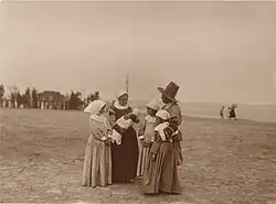 Photograph of Plymouth Colonist actors on a beach