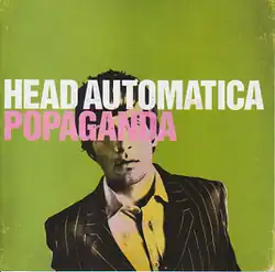 A man in a suit facing forwards with the band's name and the album's title covering his face, against a lime green background