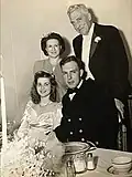 Milton and Dorothy Portmann (top) at oldest son's (seated) wedding, 1945