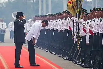 Guard of honour of the Royal Brunei Armed Forces in ceremonial uniforms.