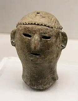Qijia culture pottery head.