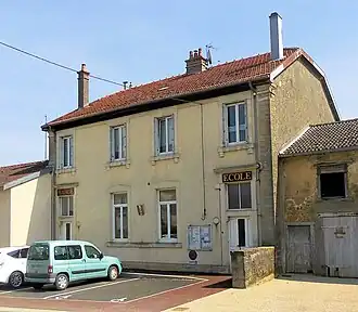 The town hall and school in Rainville