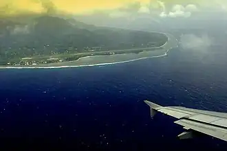 An aerial view of the airport and the island's mountainous interior