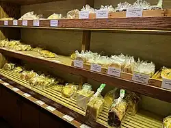 Photograph of shelves displaying various baked goods