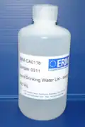 A natural river water certified reference material in its polythene bottle after production