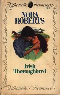 The center of the cover shows the head and torso of a woman with long hair, leaning against the head and torso of a man. The man's right hand cups her neck, and the couple are looking at each other. In the background are a horse and a large building. Above the image are the words "Nora Roberts" and "Irish Thoroughbred". The outer edges of the cover have a solid border, with the words "Silhouette Romance" repeated. In the top right corner is the number 81.