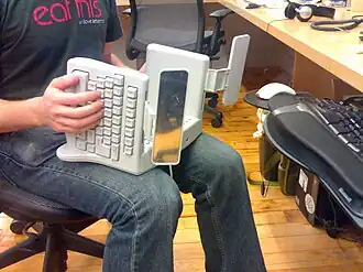 The SafeType keyboard is a fixed split keyboard with a 90° tenting angle