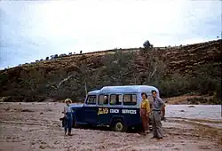 8-seater Jeep, a part of Tuit's Coach Services, bogged in Finke River, c. 1957