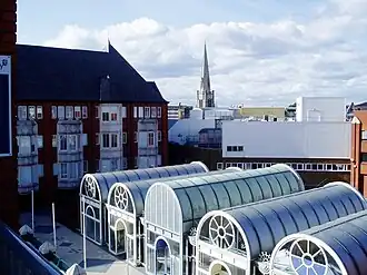 Roof top of Ealing Broadway Centre; in the background is the spire of Christ the Saviour Church