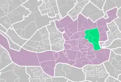 Kralingen-Crooswijk (light green) within Rotterdam (purple).