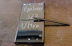 Samsung Galaxy Note series of smartphones, as well as Galaxy S22 Ultra, come with an integrated stylus called S-Pen.