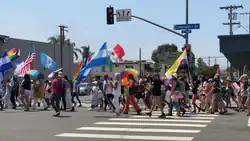A group of marchers carrying flags