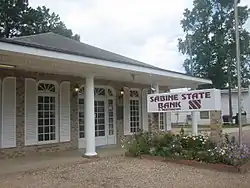 Saline houses a branch of the Sabine State Bank.