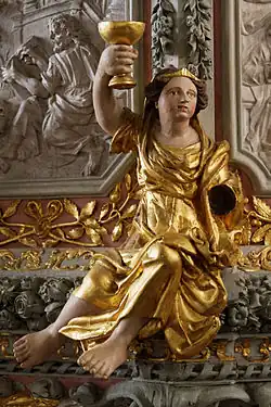 Another of the caryatides supporting the pulpit canopy.